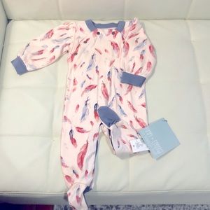 100% organic cotton, eco friendly dyes, and natural wood snap on